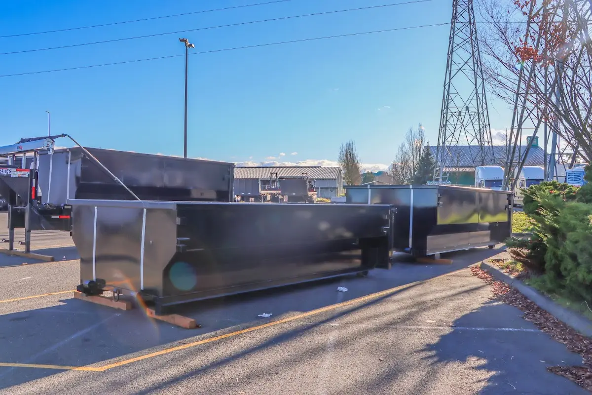 Roll-off dumpster ready for waste disposal at job site for Demolition Dumpster Rental in Gresham